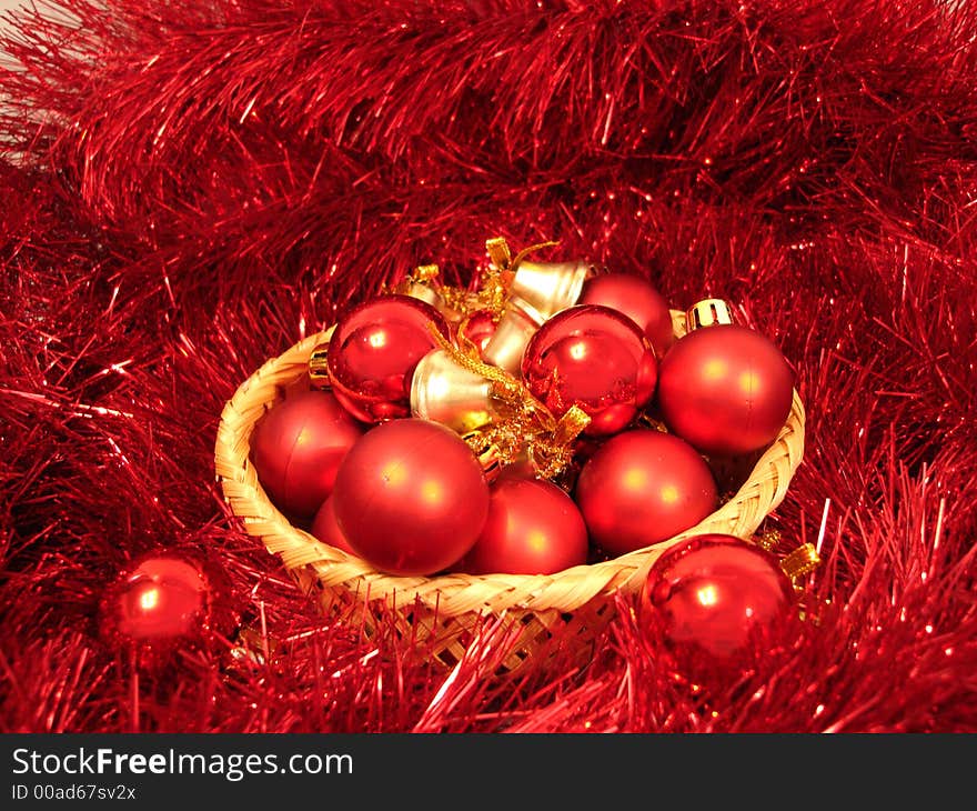 Red Christmas Balls On A Basket And Garland