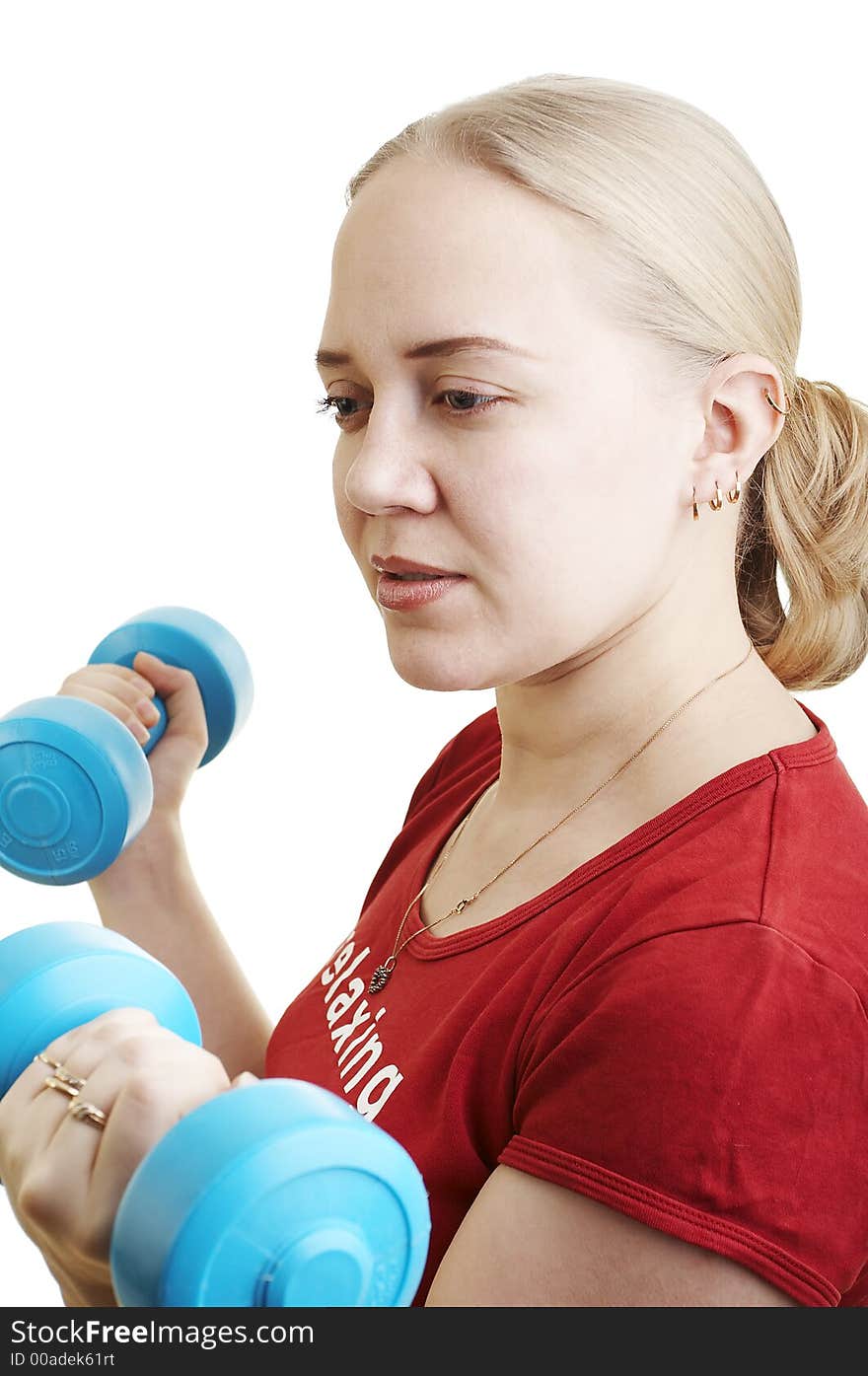 Young woman doing exercise on the gym. Young woman doing exercise on the gym