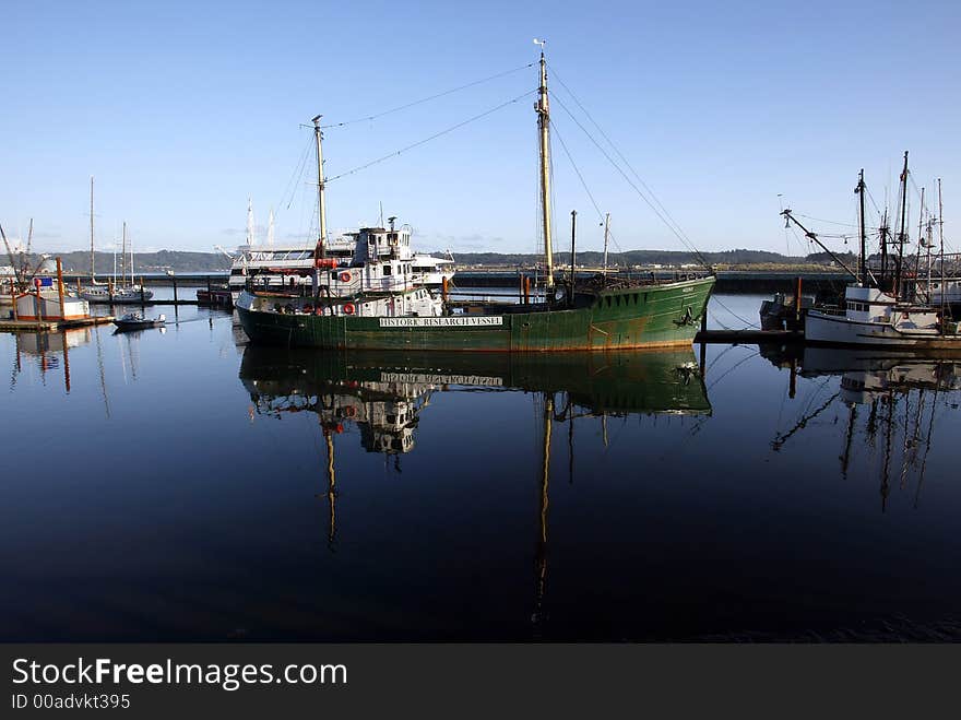 Green Sea Vessel Docked in harbor. Green Sea Vessel Docked in harbor