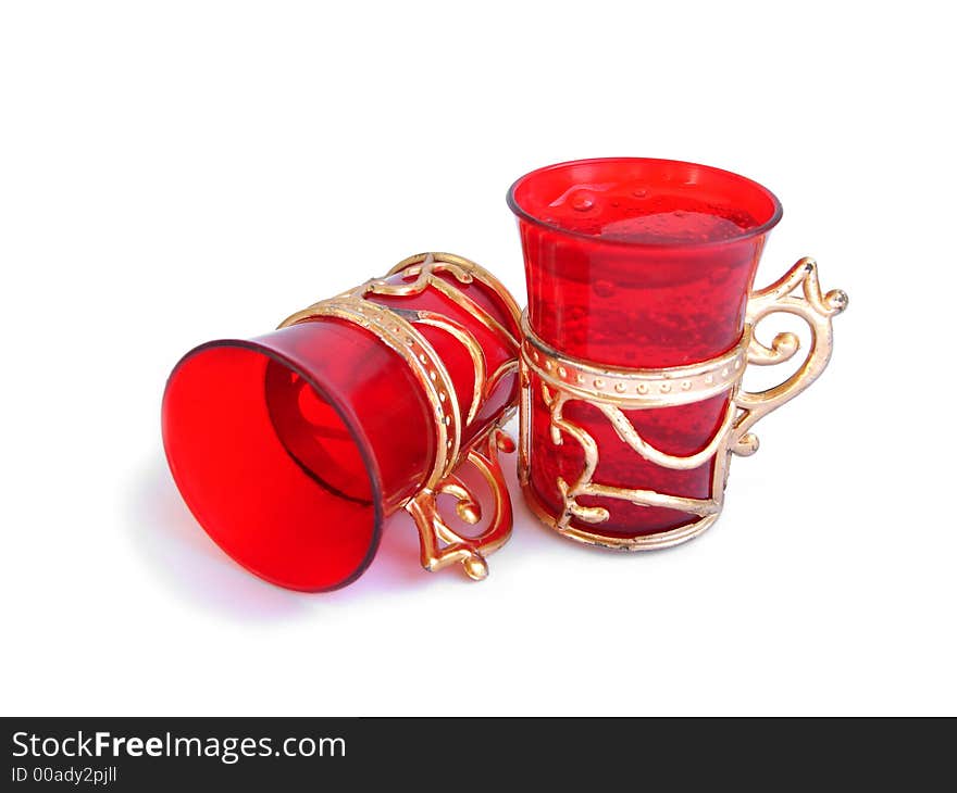 Two beautiful red glass on a white background