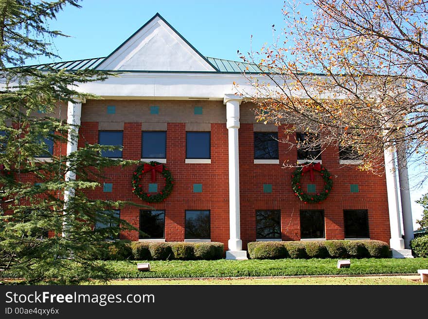 Brick government building decorated for Christmas. Brick government building decorated for Christmas