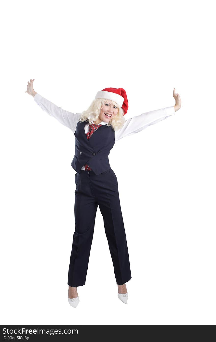 Young beautiful woman in a santa's cap smiling. Isolated on white. Young beautiful woman in a santa's cap smiling. Isolated on white.