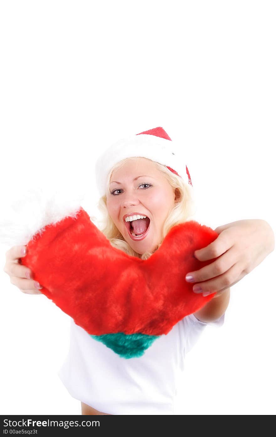 Young beautiful woman in a santa's cap smiling. Isolated on white. Young beautiful woman in a santa's cap smiling. Isolated on white.