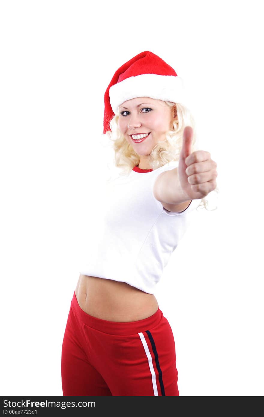 Young beautiful woman in a santa's cap smiling. Isolated on white. Young beautiful woman in a santa's cap smiling. Isolated on white.