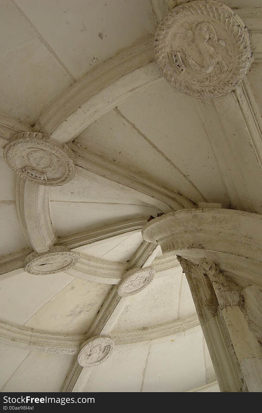 A typical renaissance stairway spiral with cartouches in a French Loire valley castle. A typical renaissance stairway spiral with cartouches in a French Loire valley castle