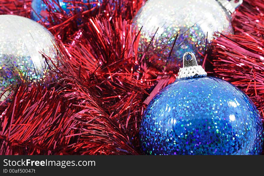 Close-up of blue silver and red christmas ornaments