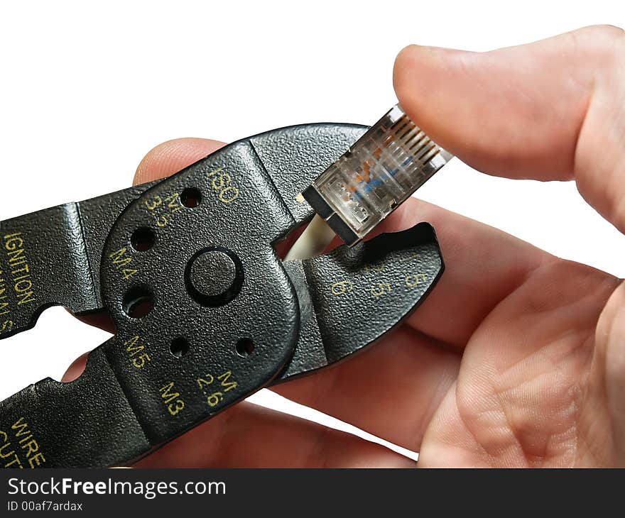 Wire cutter and hand isolated on white background with path. Wire cutter and hand isolated on white background with path