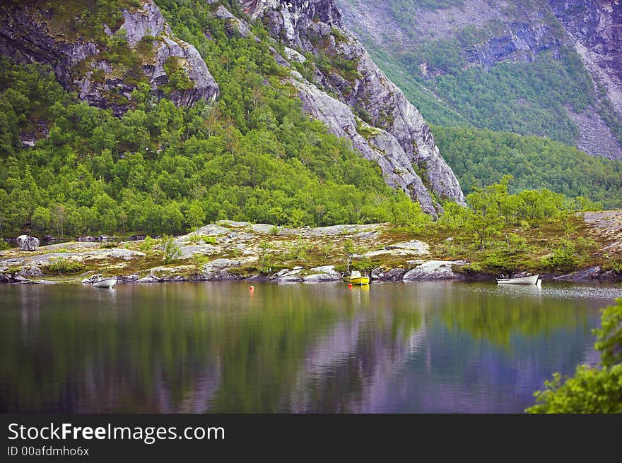 Photo of mountain lake in Norway, north of the Polar Circle