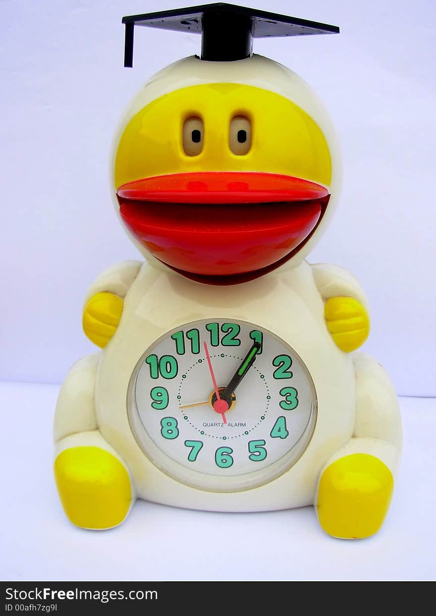 An duck alarm clock with white background close up