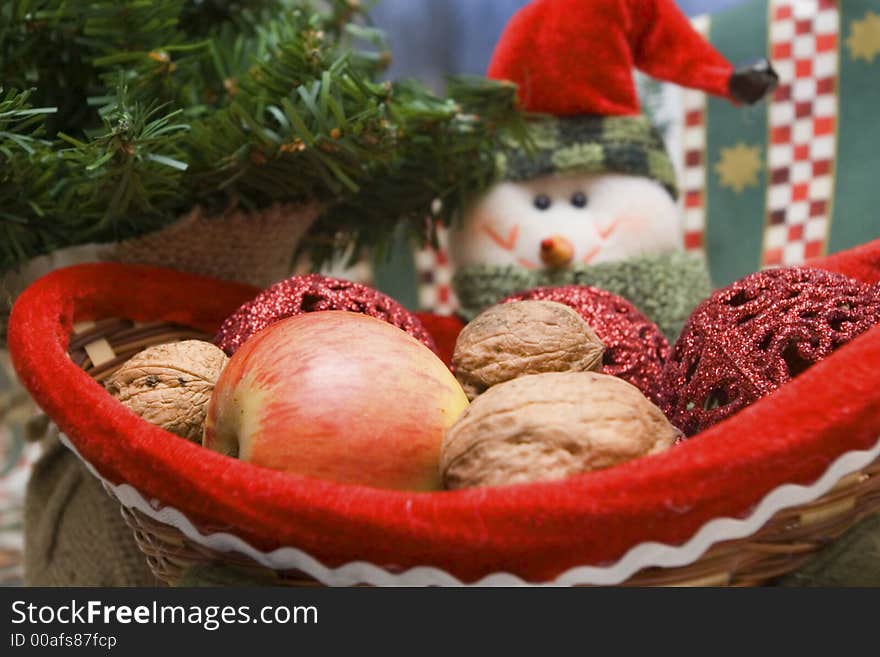 Snowmen with basket of christmas presents. Snowmen with basket of christmas presents