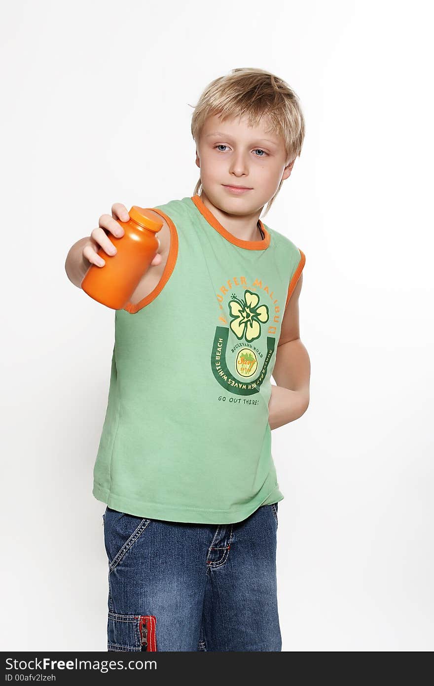 A boy holds in hands  packing with vitamins.