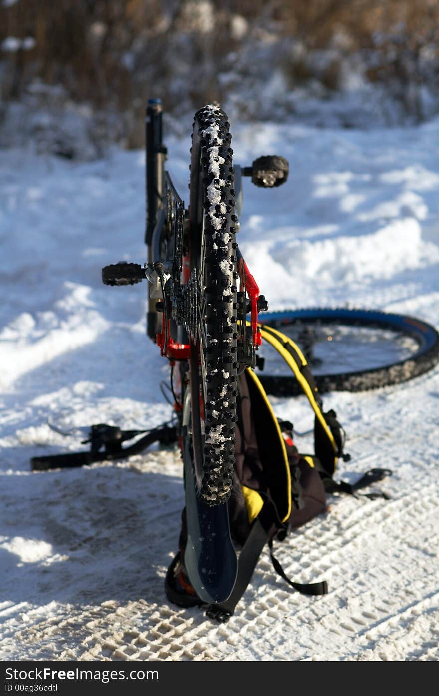 Crossover bicycle on snow road. Crossover bicycle on snow road