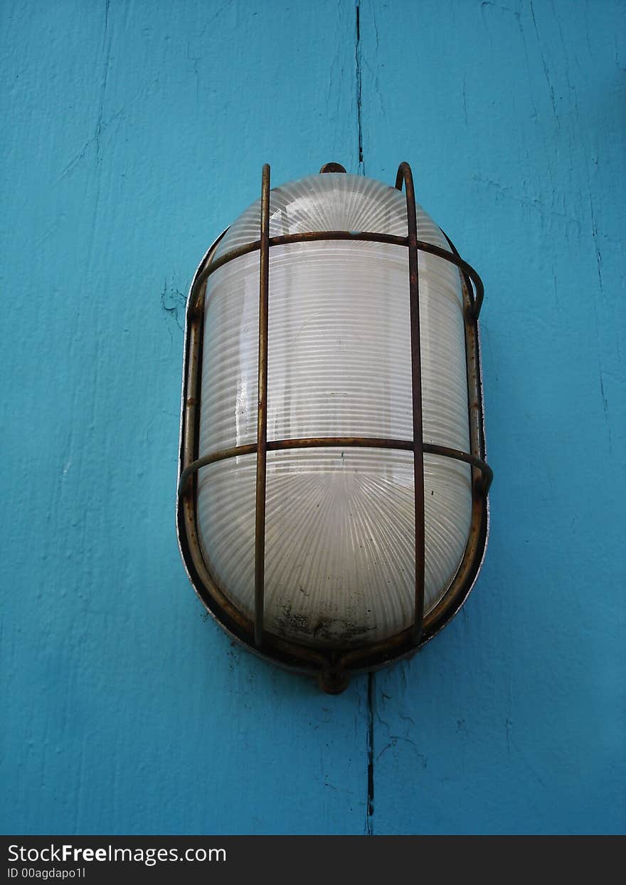 Light on a blue wood wall