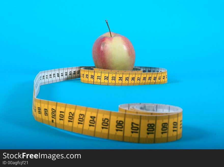 Apple with a measure tape. Apple with a measure tape