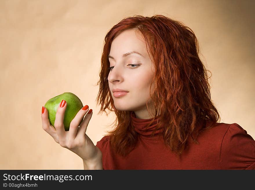 Portrait of woman with a green apple. Portrait of woman with a green apple