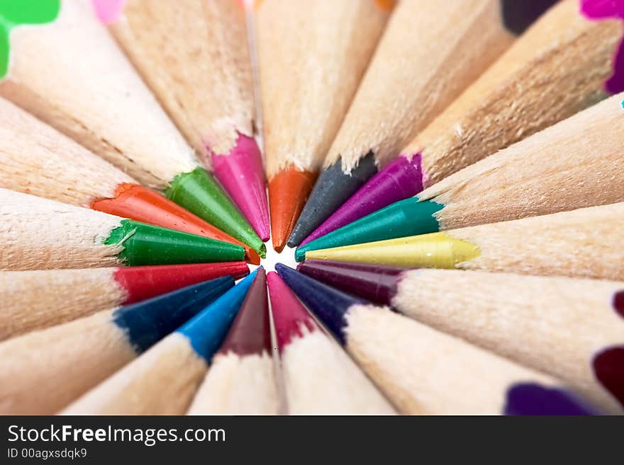 Thick colored pencils against a white background color