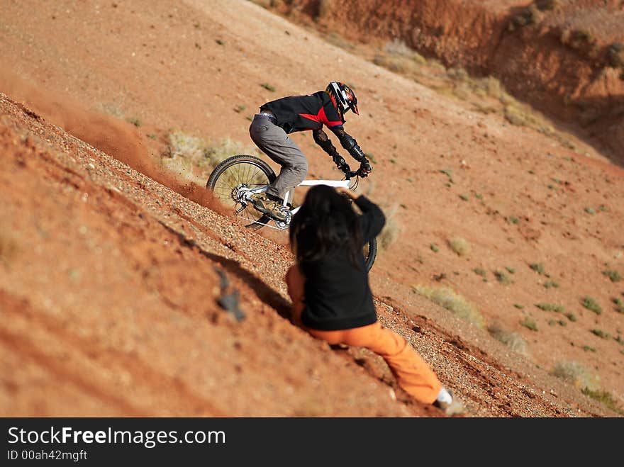 Extreme bike photosession in red canyon