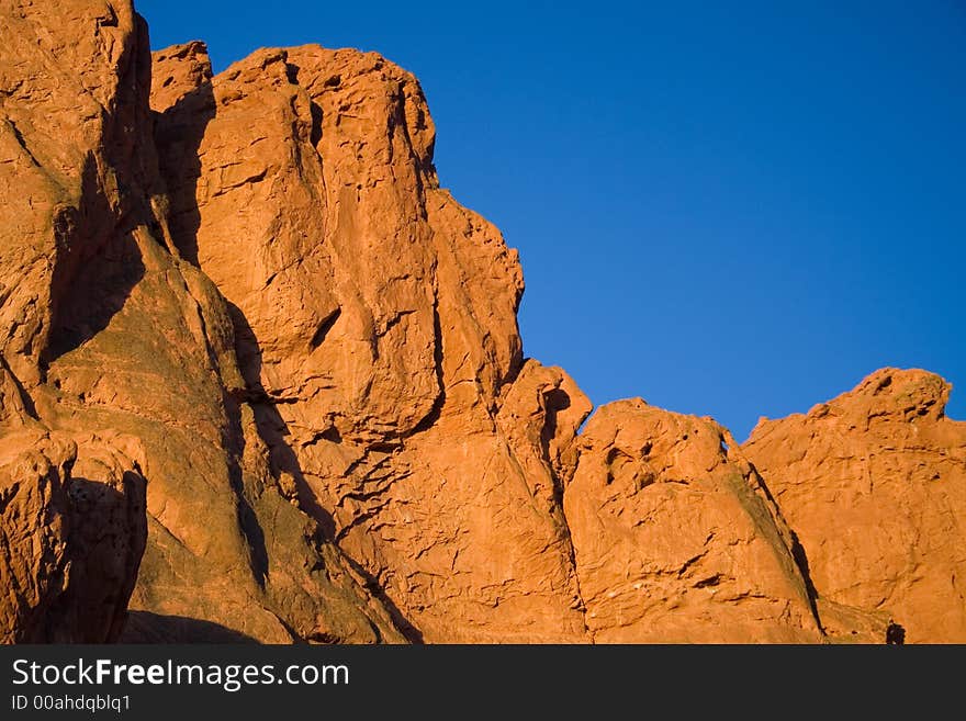Red rock formation illuminated by the morning sun, taken at the Garden of the Gods park in Colorado Springs.