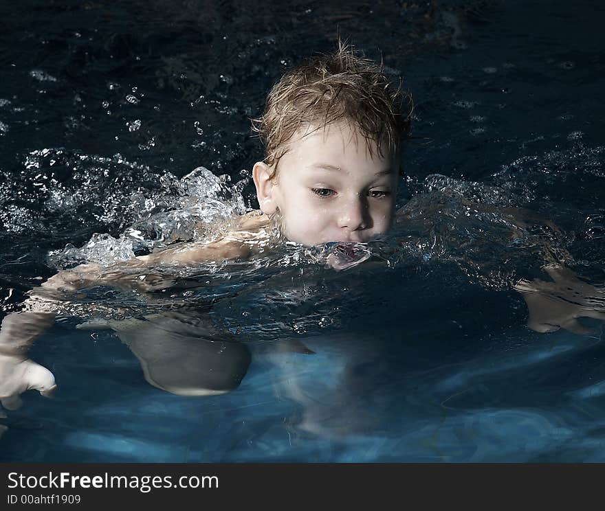 Small boy in swimming pool. Small boy in swimming pool