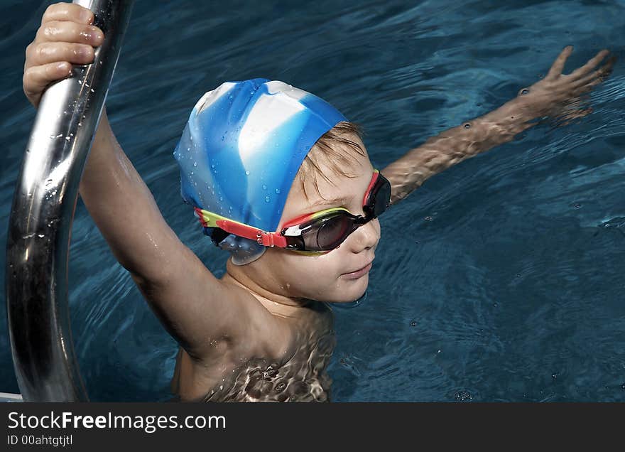 Small boy in swimming pool. Small boy in swimming pool