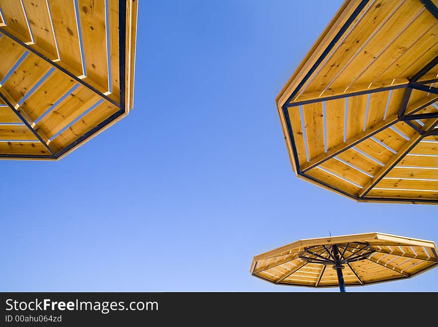 Parasols on a background of the sky