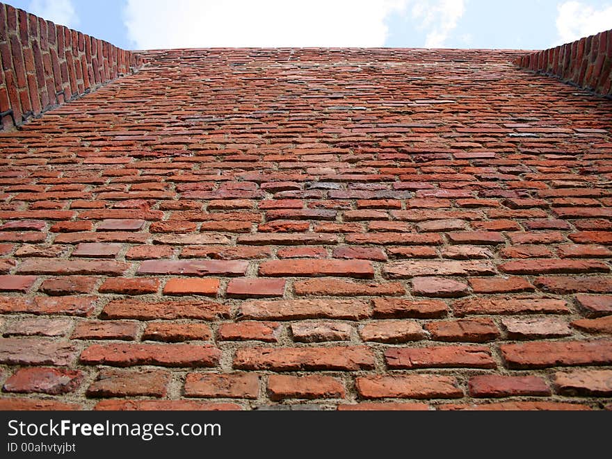 Old wall on blue sky