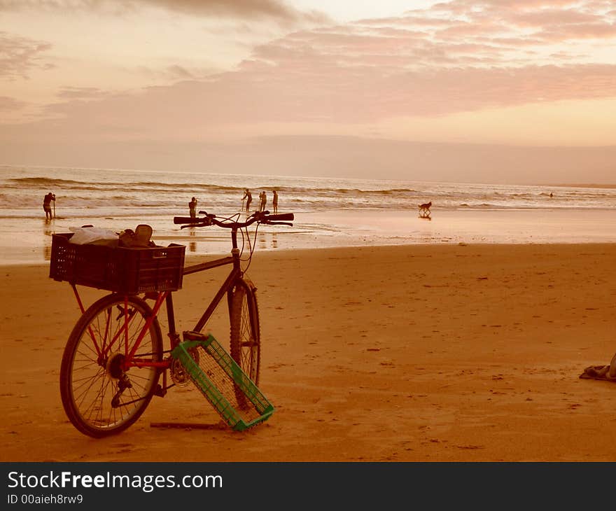 Sunset beach in europe country with bike wallpaper