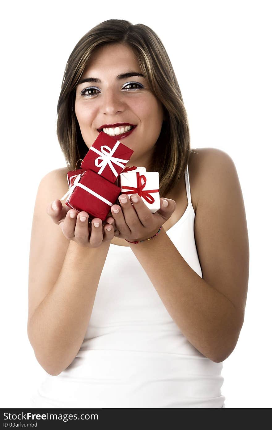 Christmas season! Different poses of a beautiful woman with small gifts on the hands.  (Focus is especially on the gifts). Christmas season! Different poses of a beautiful woman with small gifts on the hands.  (Focus is especially on the gifts)