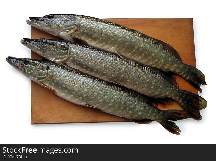 Two pikes for preparation of a fish soup. Two pikes for preparation of a fish soup