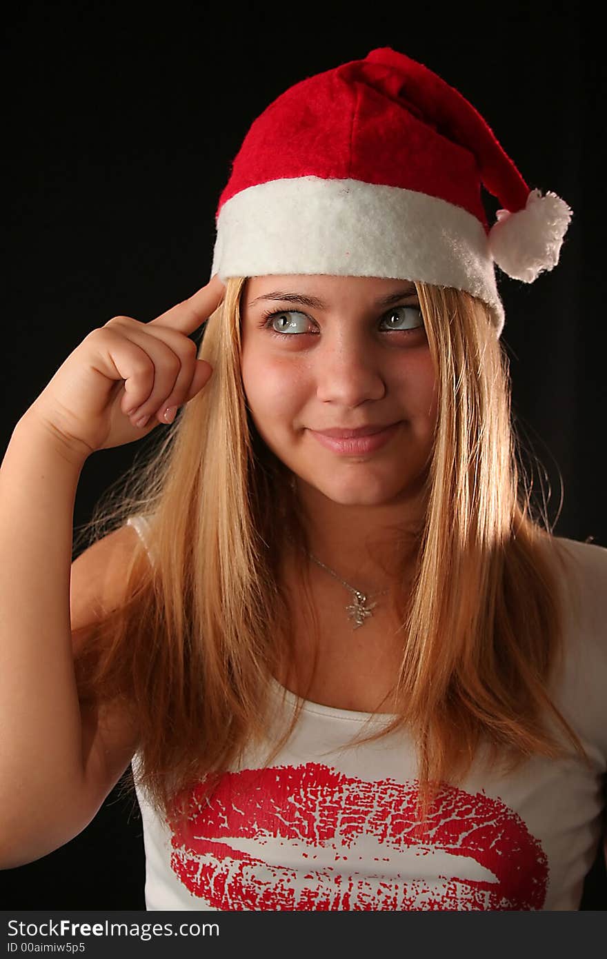 Attitude Christmas blonde girl, black background. Attitude Christmas blonde girl, black background