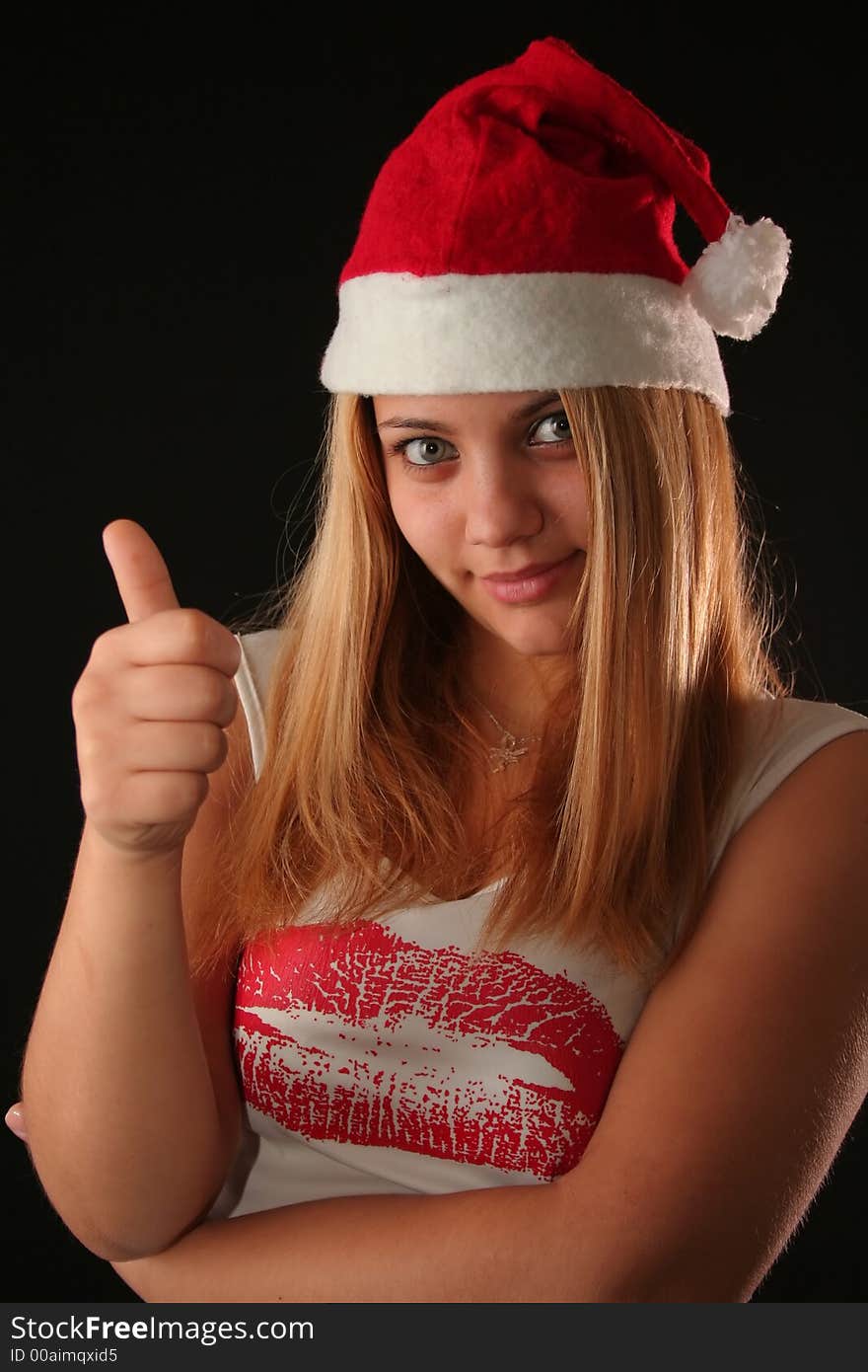 Attitude Christmas blonde girl, black background. Attitude Christmas blonde girl, black background