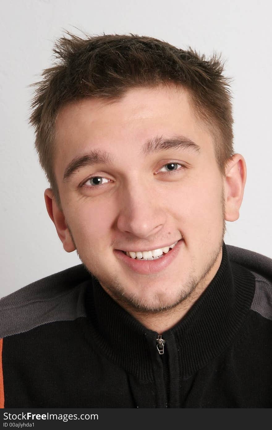 Portrait of a smiling young man. Portrait of a smiling young man.