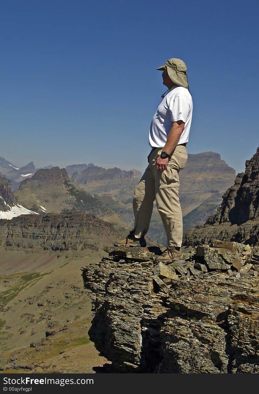 This image of the climber on the rock ledge was taken in western MT. This image of the climber on the rock ledge was taken in western MT.