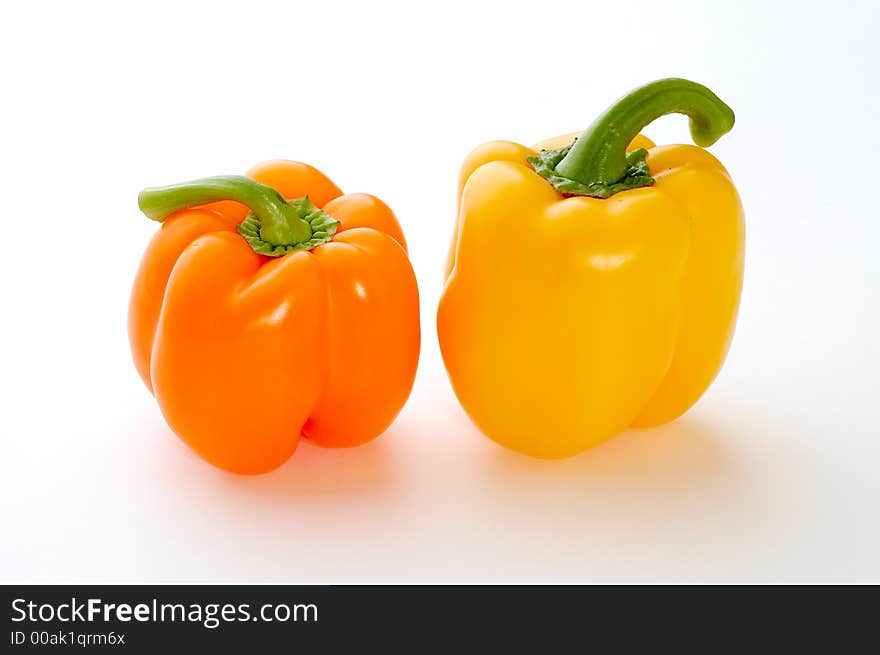 Two sweet peppers on white. Two sweet peppers on white