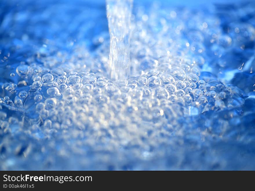 Some bubbles on  blue water