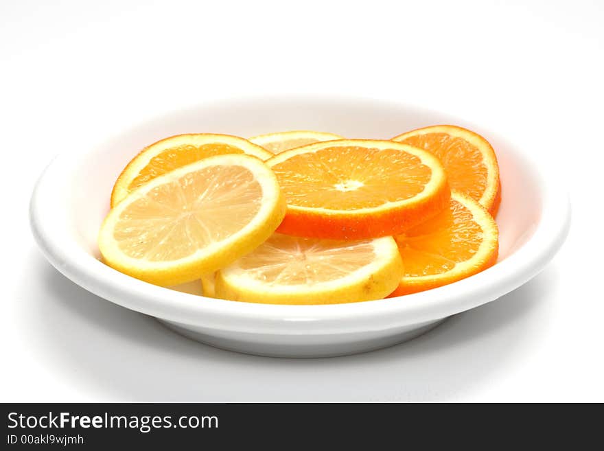 Some lemons and some oranges. Some lemons and some oranges