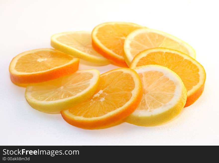 Some lemons and some oranges. Some lemons and some oranges