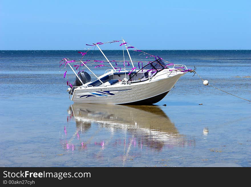 Fishing boat with pink decorations. Fishing boat with pink decorations