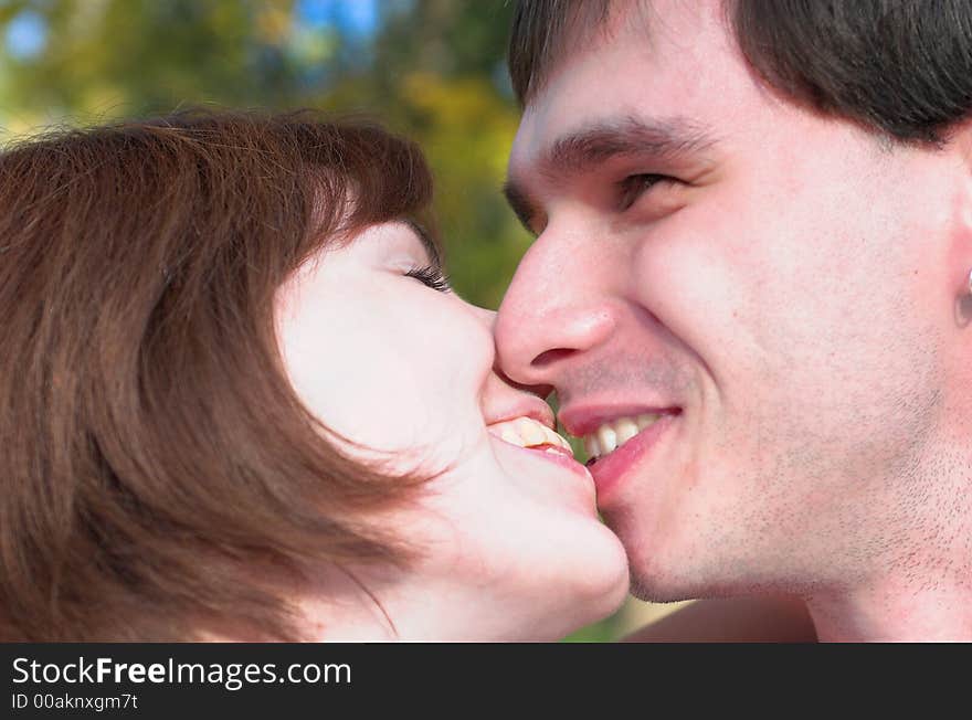 Happy kissing couple in the autunm forest, Istra, Russia