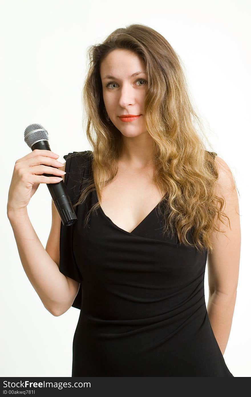 Pretty singer. Woman with microphone on white background.