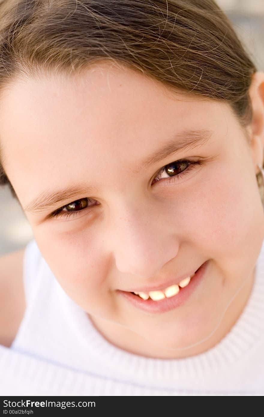 Little girl with brown long hair, being happy and smiling. Little girl with brown long hair, being happy and smiling