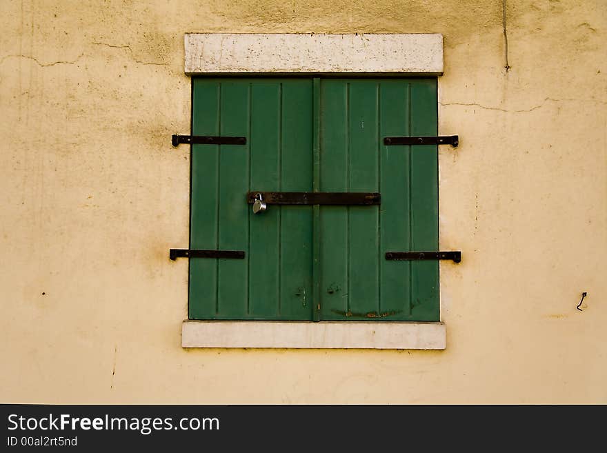 A shot of green storm doors on a warehouse in Charlotte Amalie on the island of St. Thomas in the United States Virgin islands.