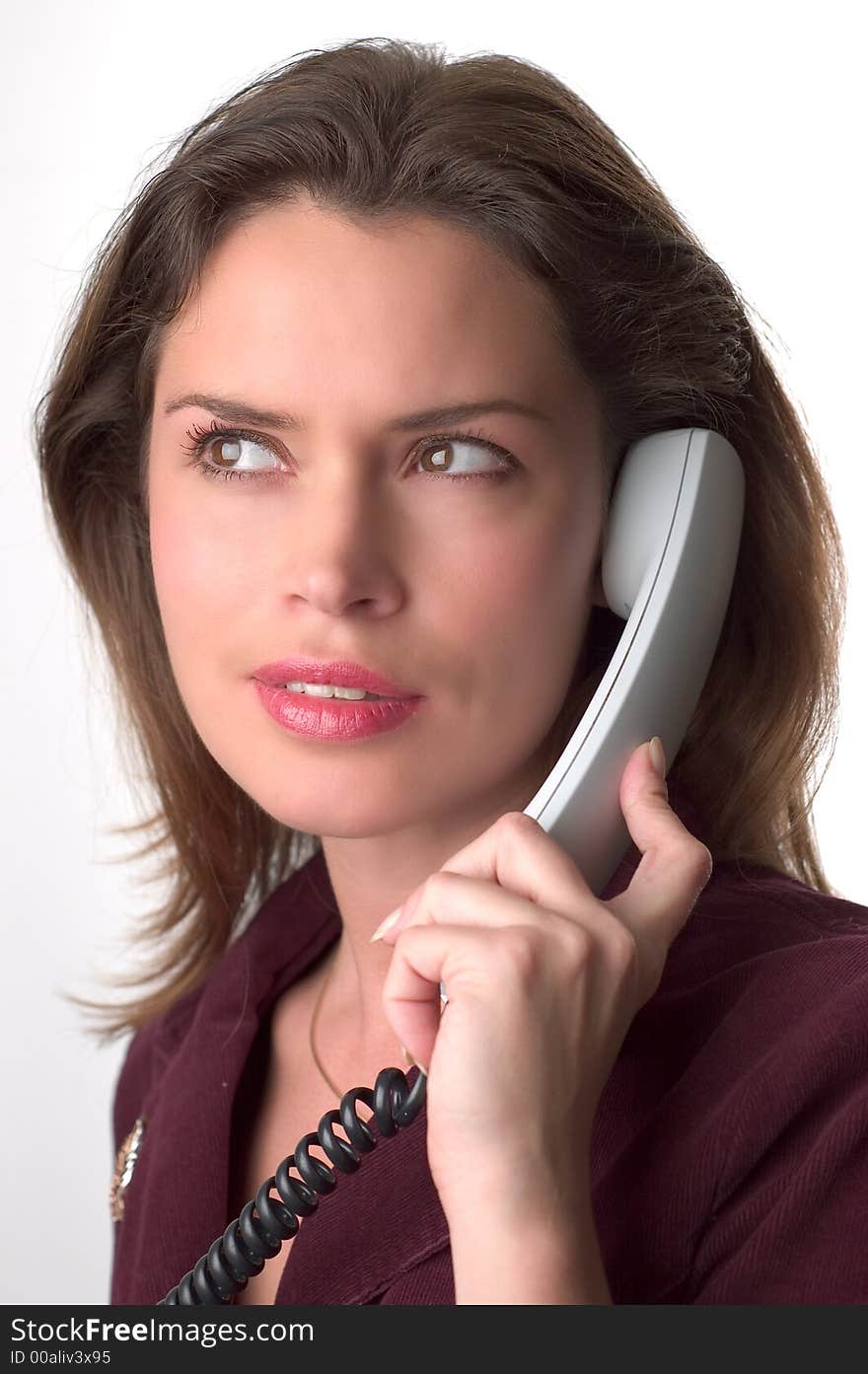 Pretty brunette secretary  with telephone headset. Pretty brunette secretary  with telephone headset