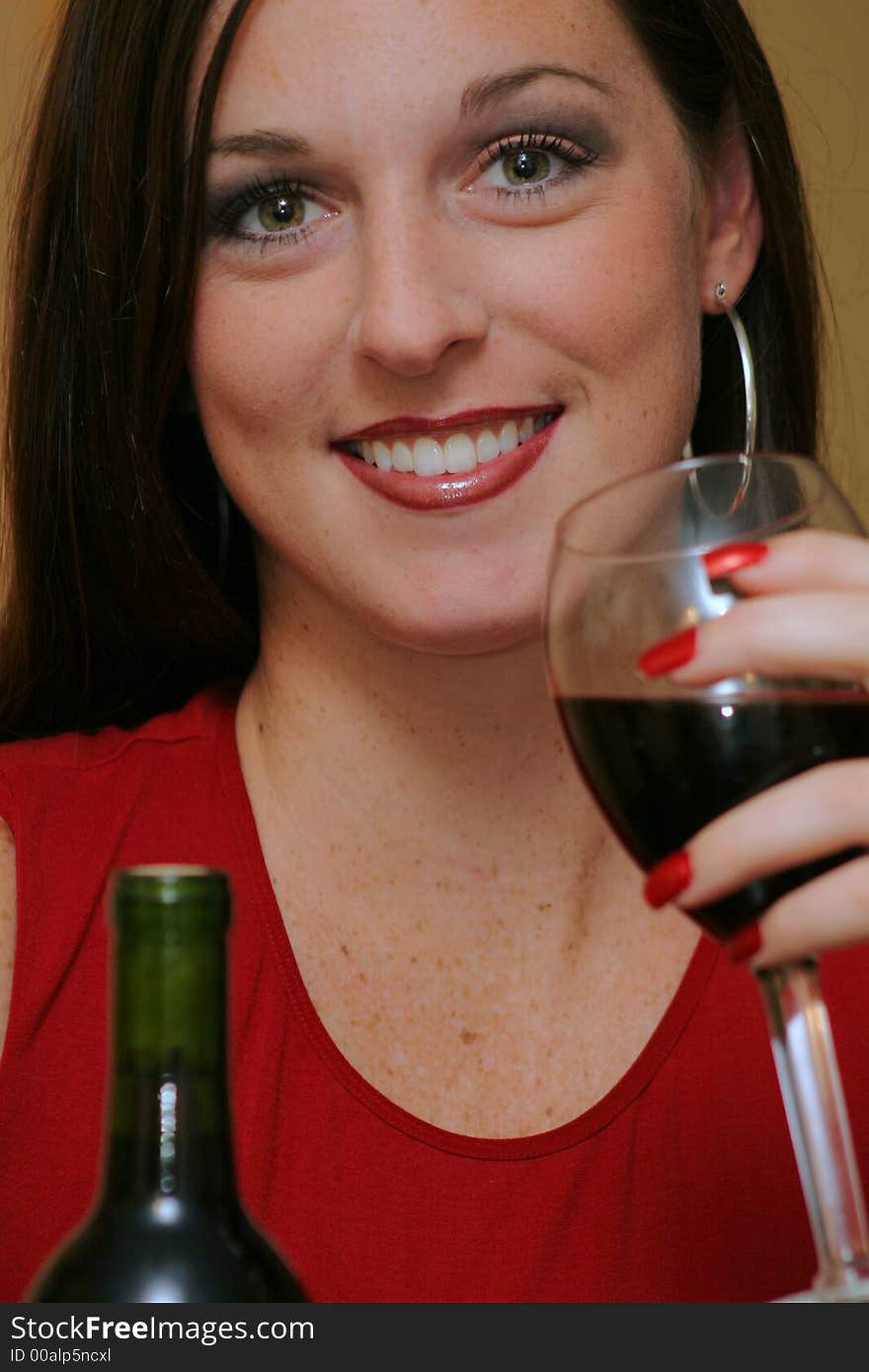 Gorgeous woman drinking wine