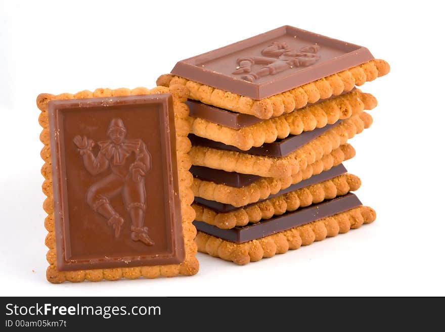 Several chocolate covered cookies on white background