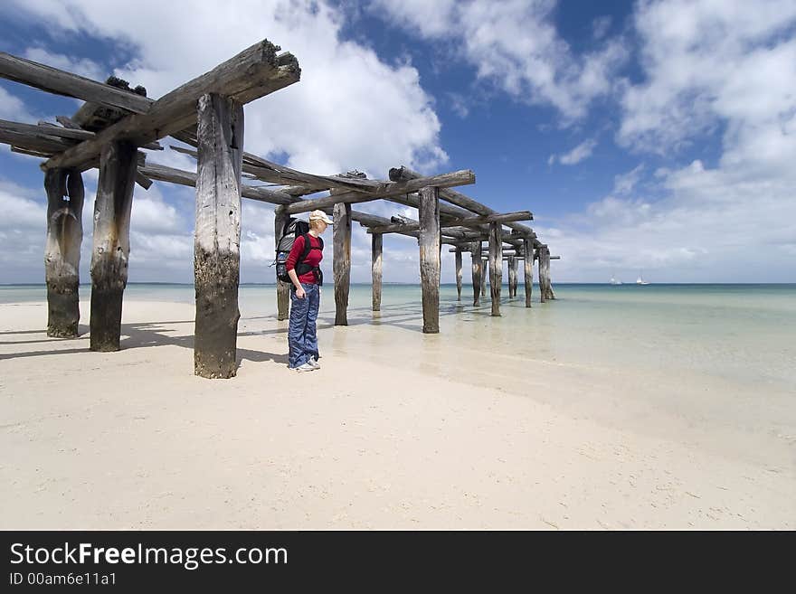 Woman hiker by pier 2