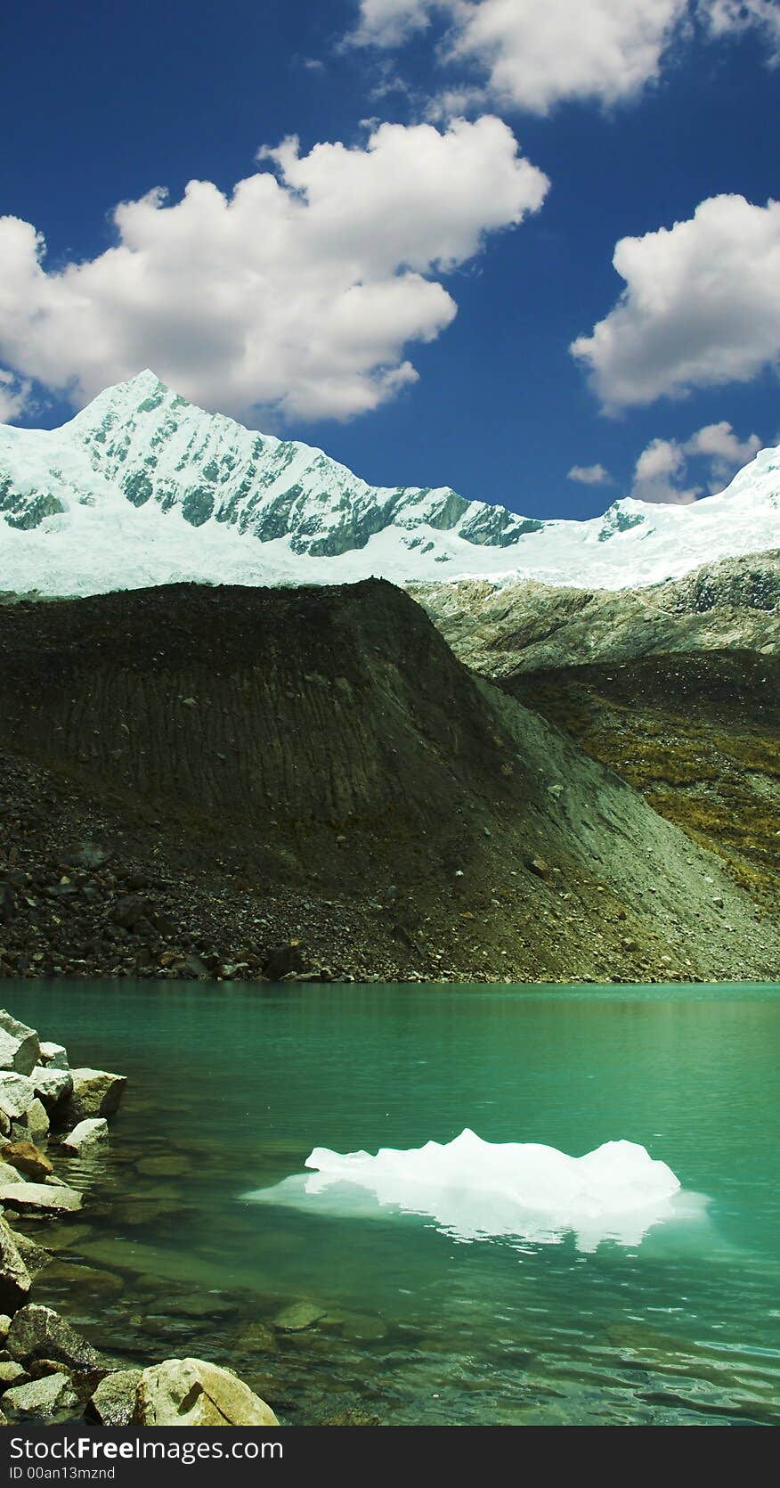 Green lake and white iceberg in Cordilleras mountain. Green lake and white iceberg in Cordilleras mountain