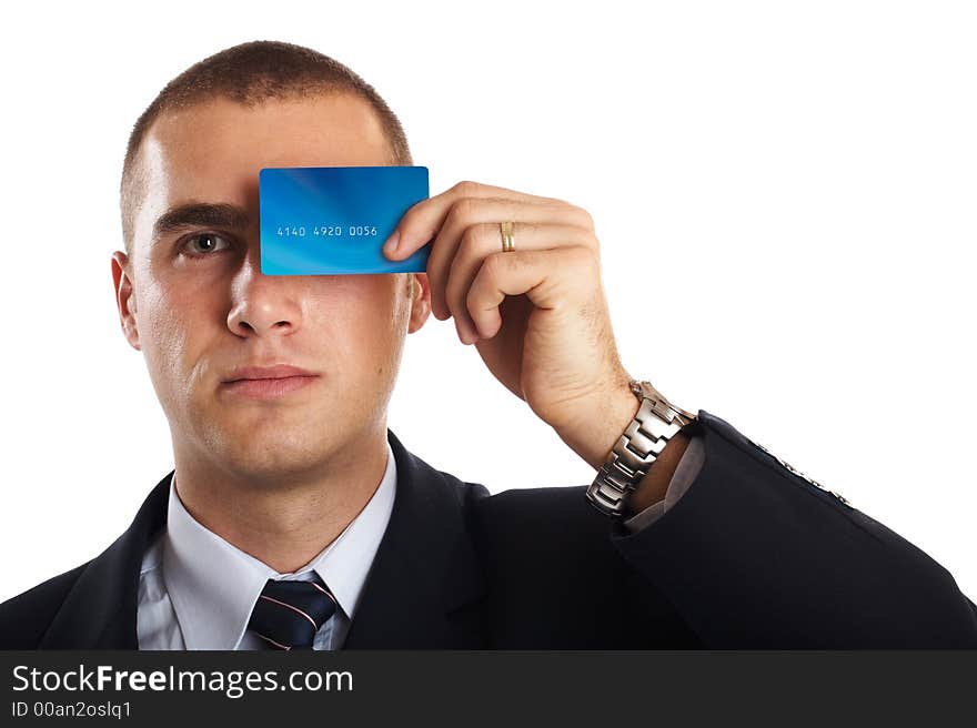 Young Modern Businessman portrait with credit card in front of his face