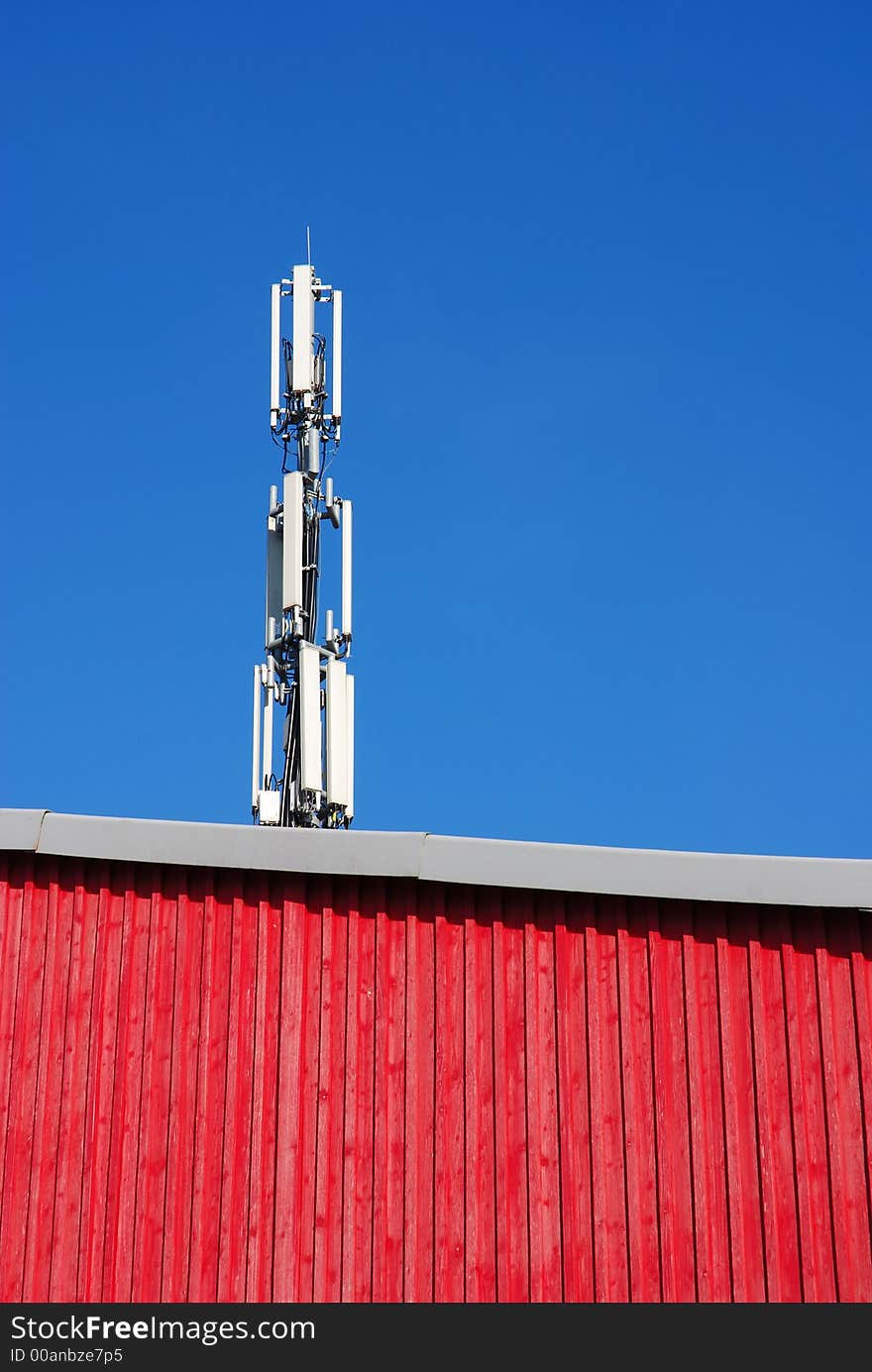 Communication Tower And Red Wall