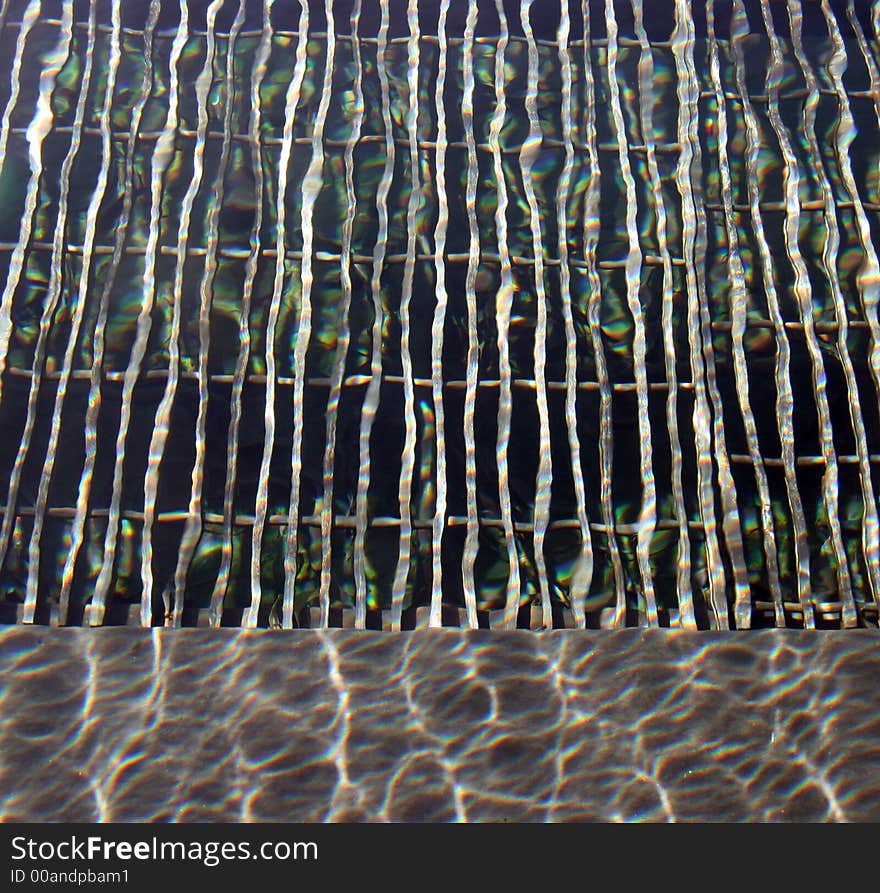 Abstract of a steel grate under water